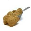 scoop of brown heart-shaped dog biscuits