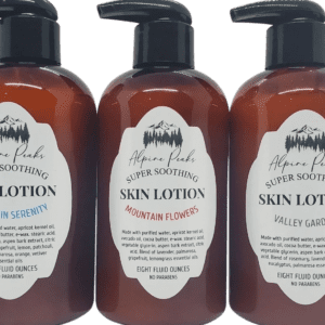 three bottles of skin lotion